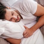 Why does a person twitch in his sleep?